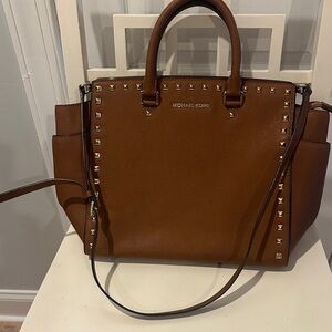 Michael Kors Selma luggage brown color Studded handbag / crossbody